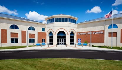 The Reading High School building with cream and tan precast concrete panels.