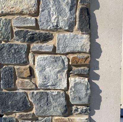 Stone applied to precast at plant prior to being transported to site