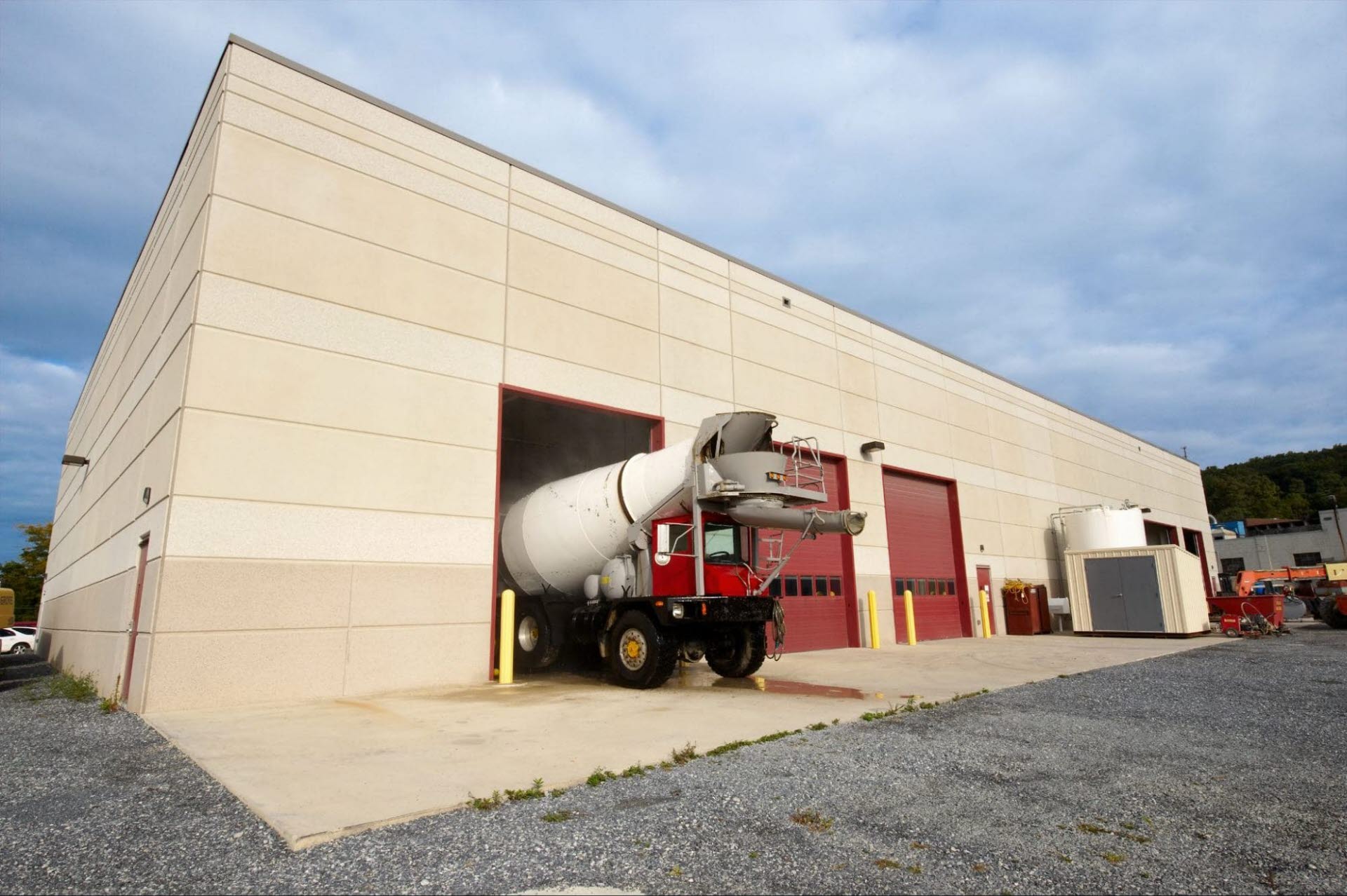 a truck pulling out of a distribution center.