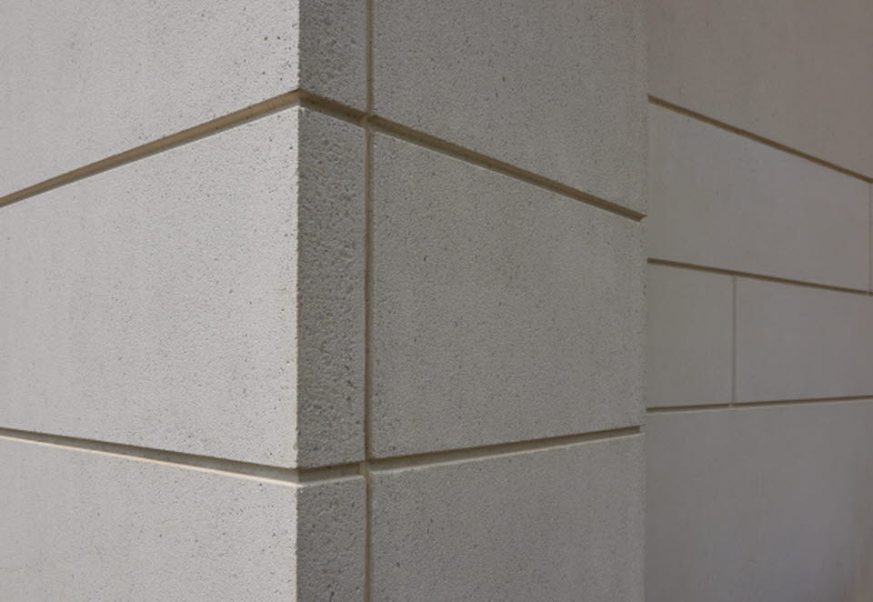 Corner edge of building with reveals and simple sandblast finish