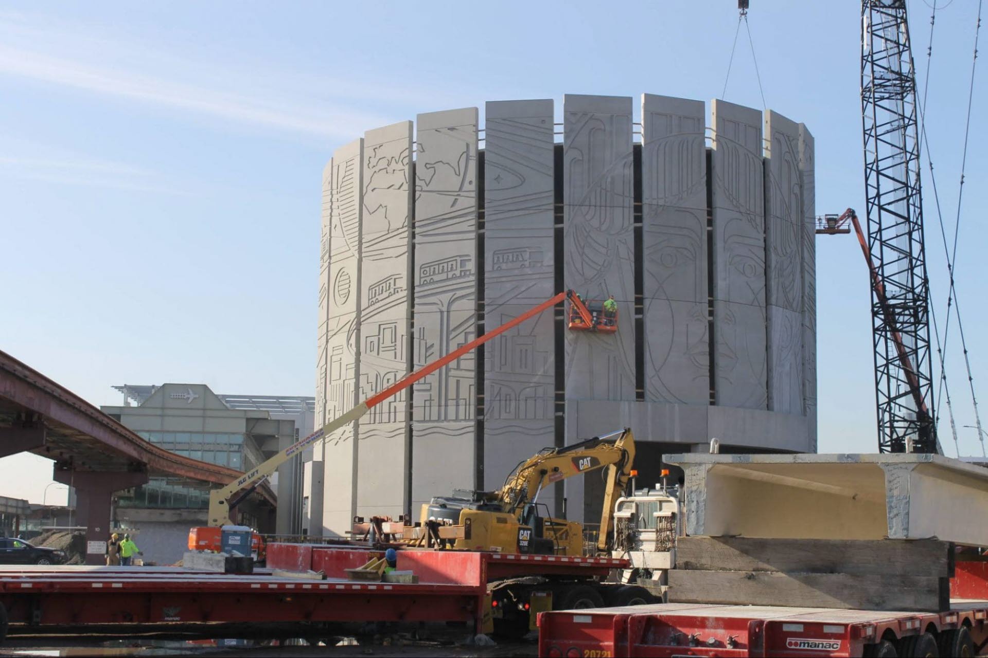 a team of workers on a precast concrete construction site