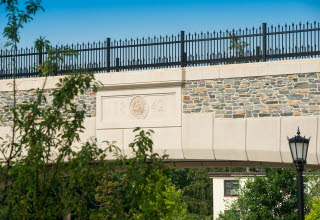 1842 and Villanova Seal on Pedestrian Bridge in concrete