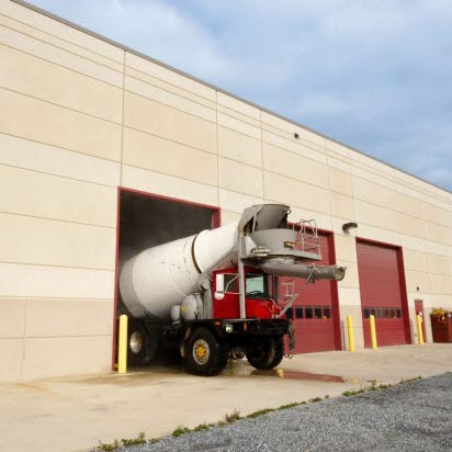 a truck pulling out of a distribution center.jpg